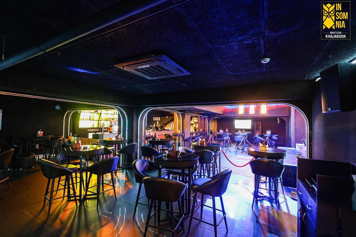 High tables beside the bar — Insomnia Night Club, Khajaguda, Hyderabad