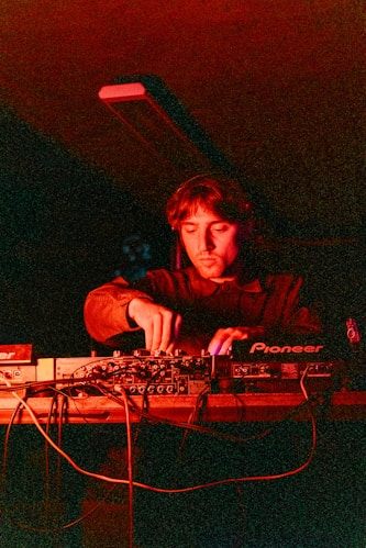 DJ under red light — Insomnia Night Club, Hyderabad