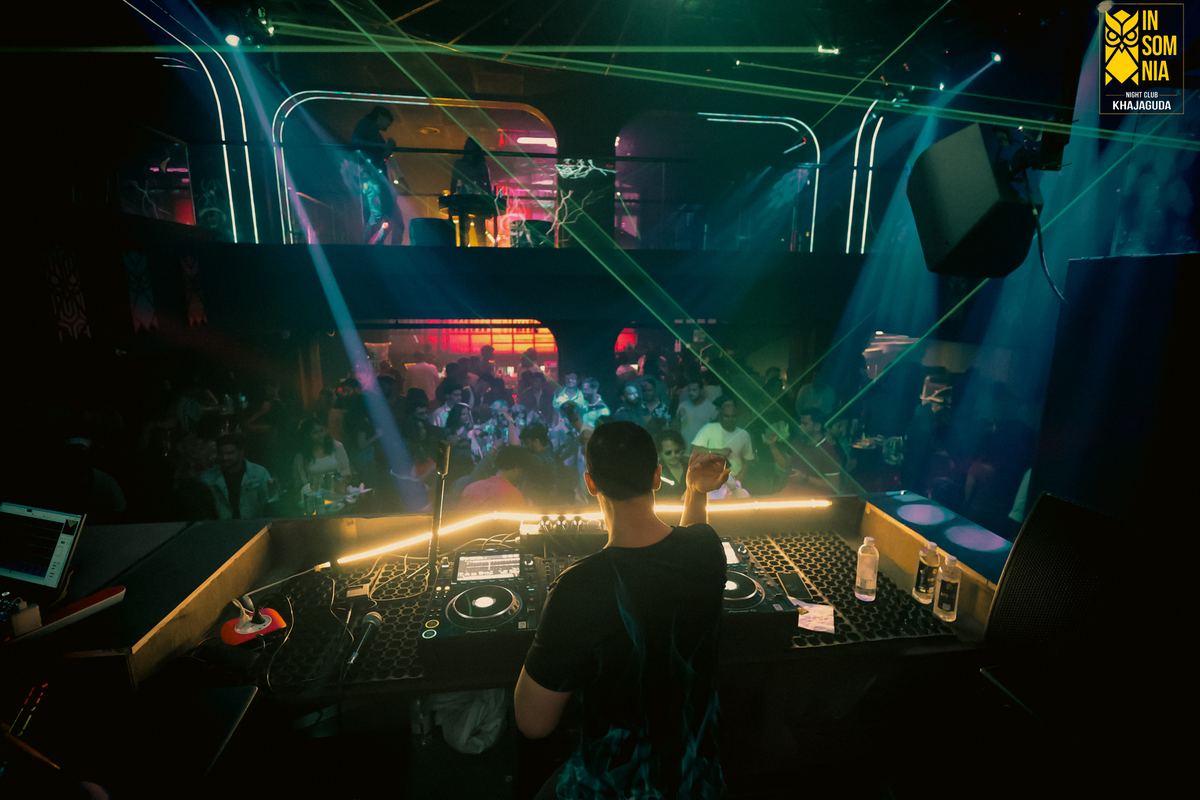Friends celebrating at the tables — Insomnia Night Club, Khajaguda, Hyderabad