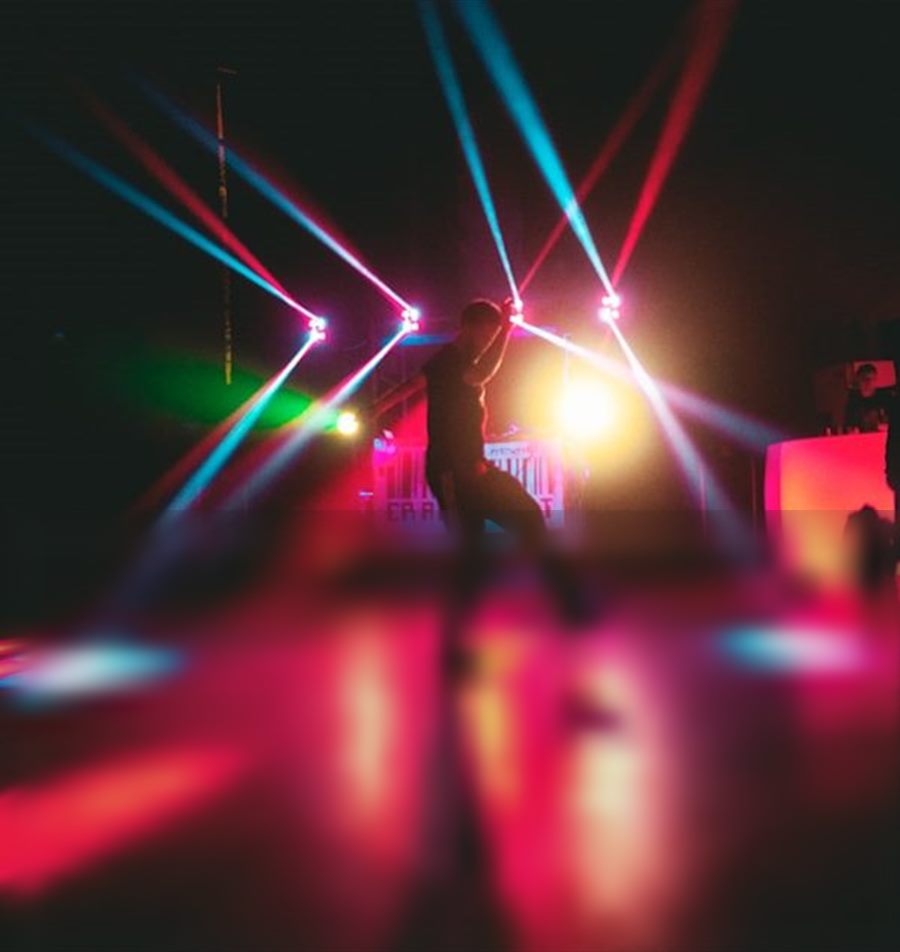 Dance floor with laser lights at Insomnia Night Club, Hyderabad